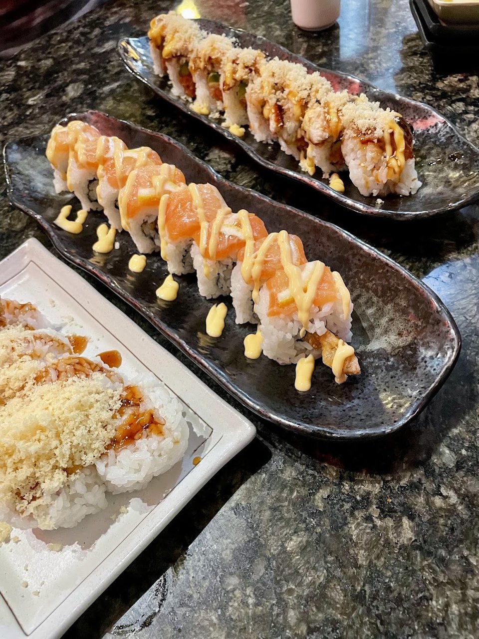 Menu layout showing appetizers, nigiri, and desserts.