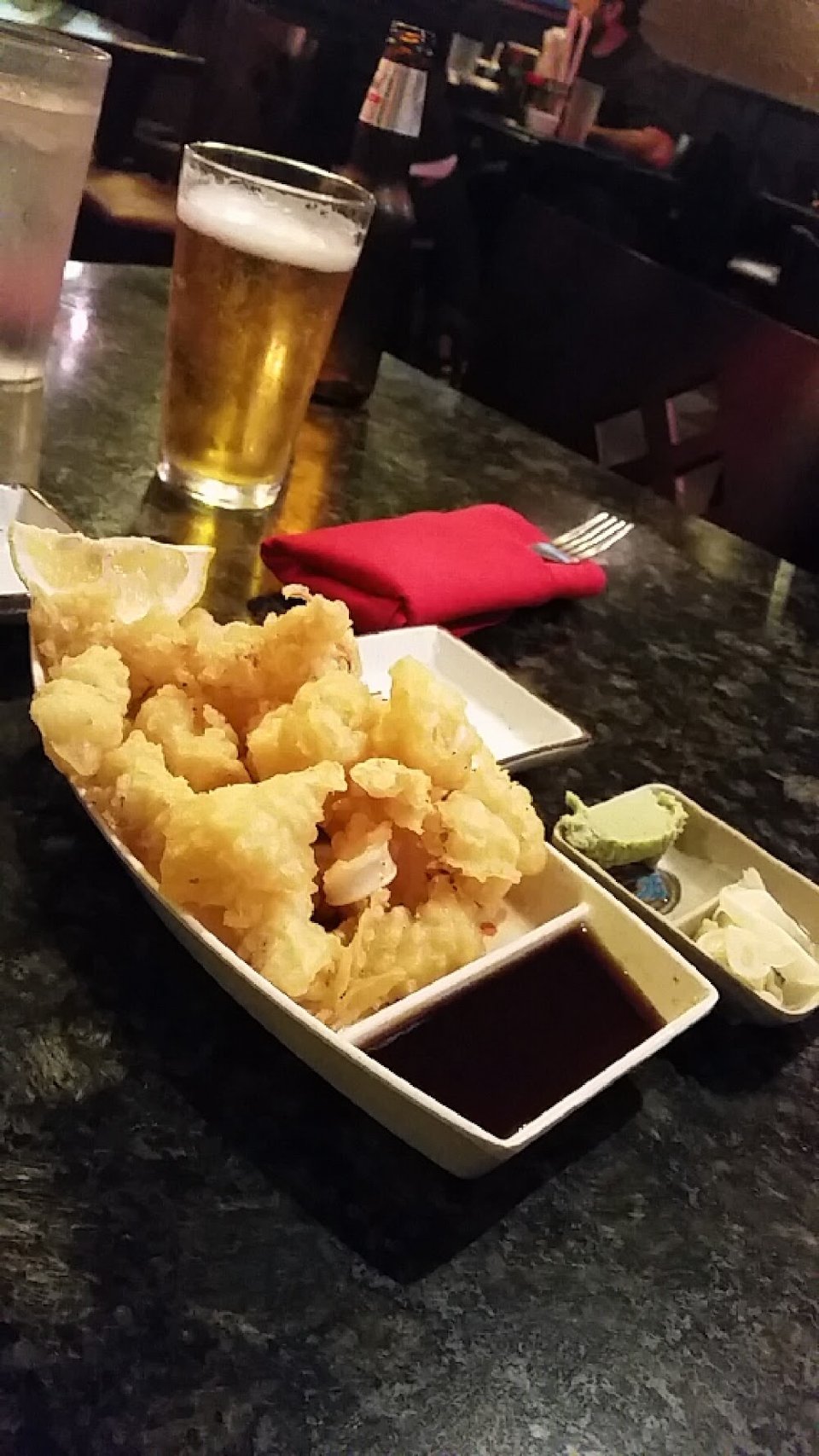 Menu layout showing appetizers, nigiri, and desserts.