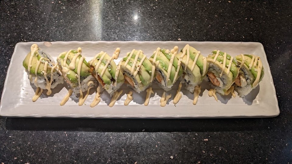 Menu layout showing appetizers, nigiri, and desserts.